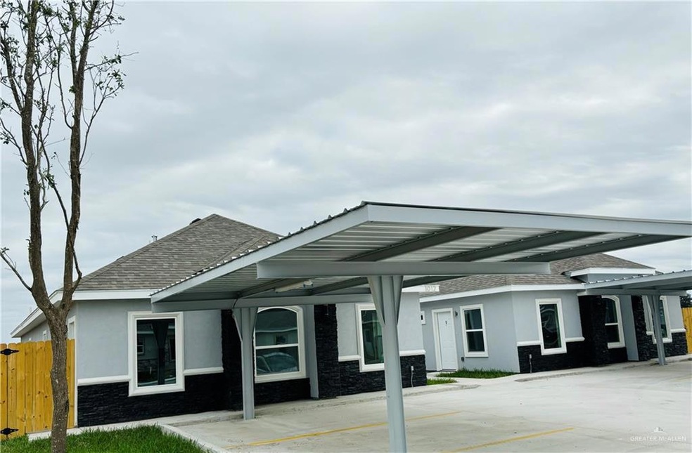 View of front of home with a carport