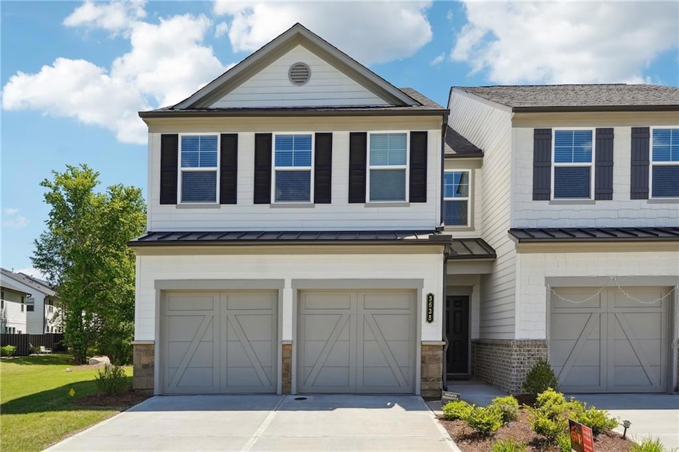 View of front of property with a garage