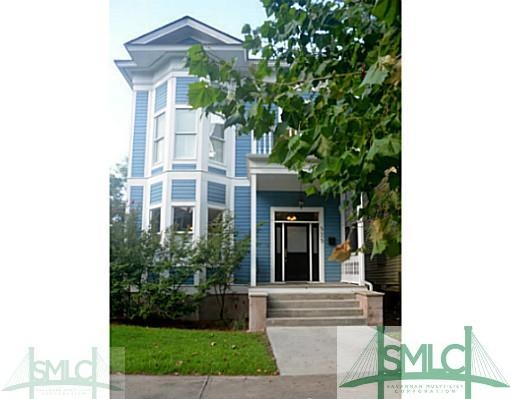 Gorgeous exterior with bay windows on the front of