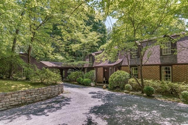 Charming Colonial style custom brick home sits on 