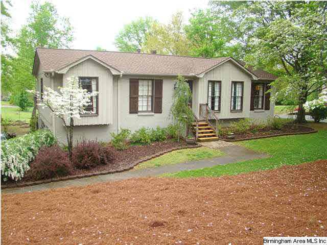 Gorgeous landscaping and excellent curb appeal