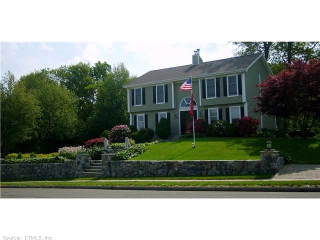 Exterior Front. Beautiful Landscaping
