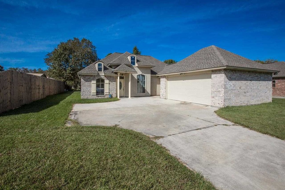 THIS IS A VERY ATTRACTIVE HOME WITH ARCHITECTURAL 