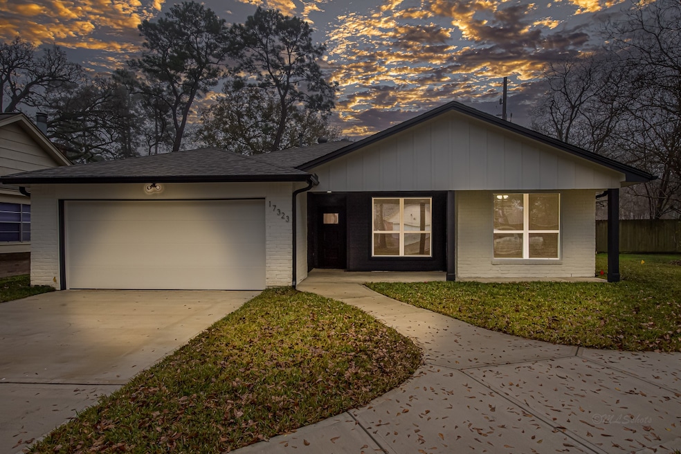 A freshly painted white exterior and brand-new dri