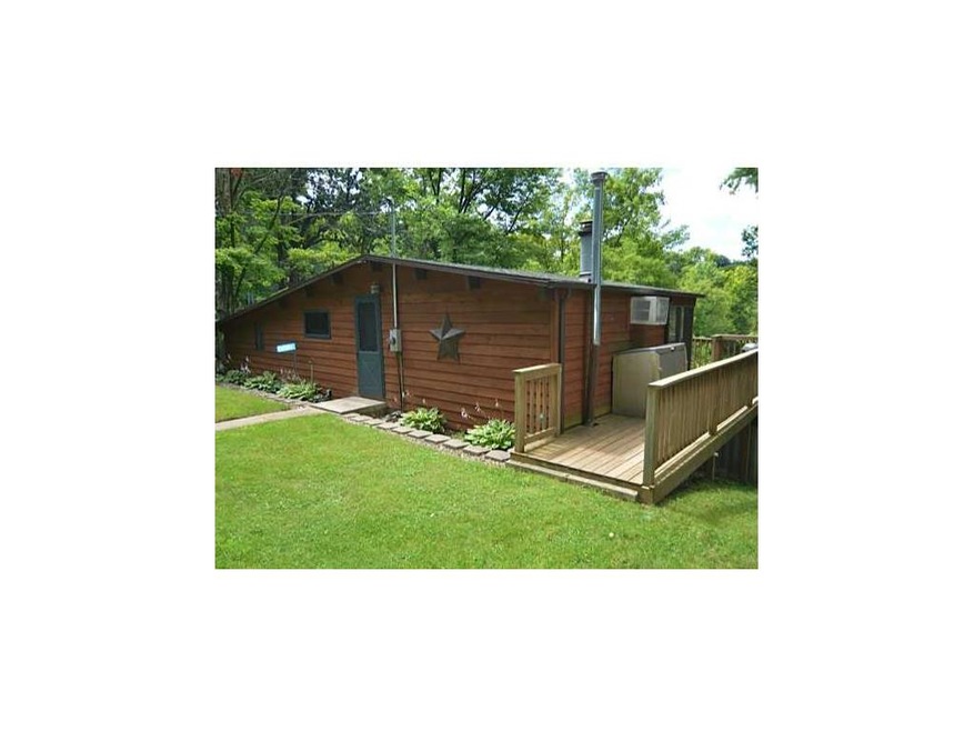 . Exterior Back, deck on main level and walkout lo
