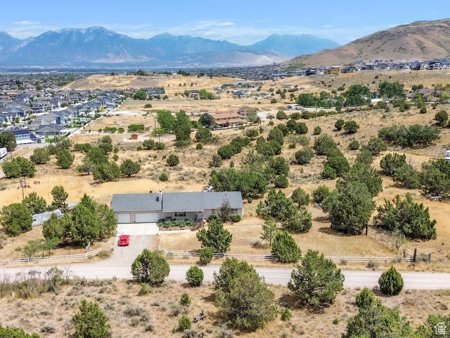 View of rural area with a mountain backdrop