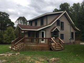 VIEW OF HOUSE FROM THE DRIVEWAY (MAYSVILLE RD)