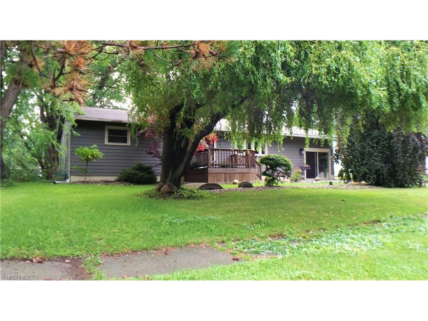 Nicely landscaped with a newer front porch