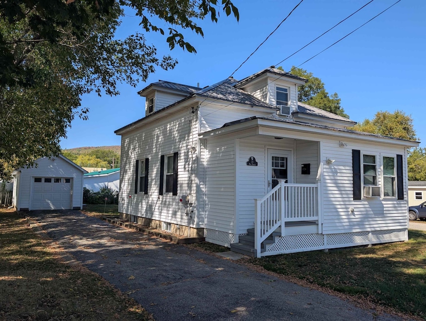 Home with 1 car garage and paved driveway