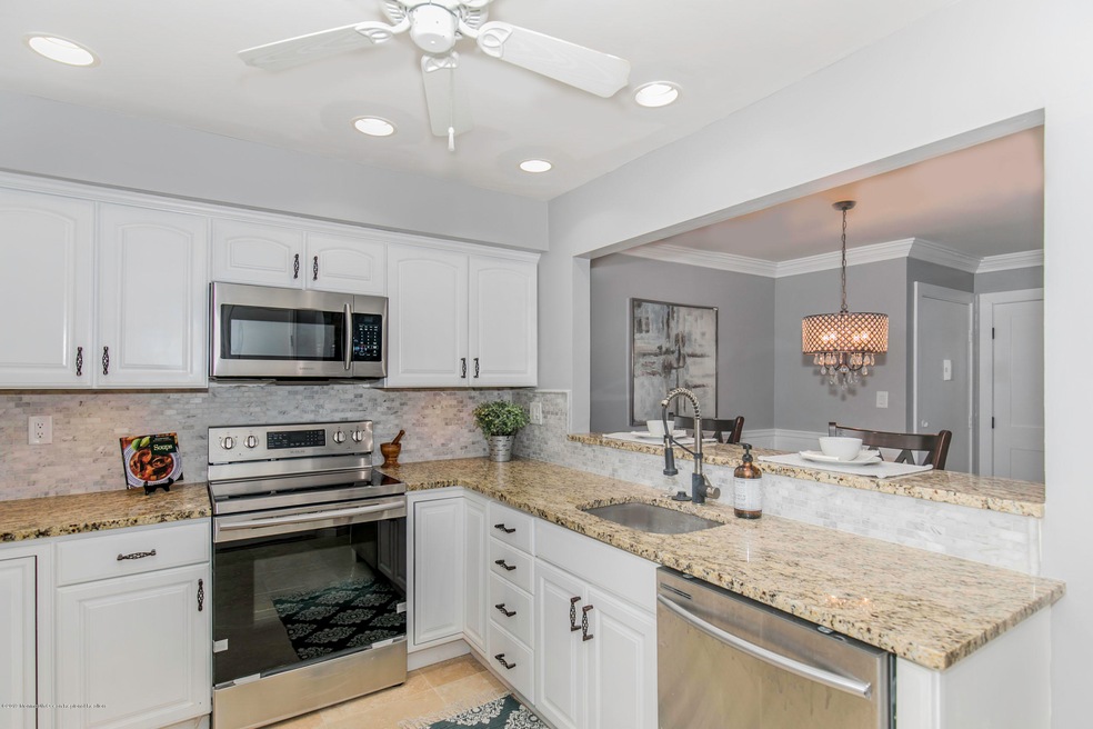 28 Medford Ct unit 136G, Red Bank, NJ 07701 - photo 1