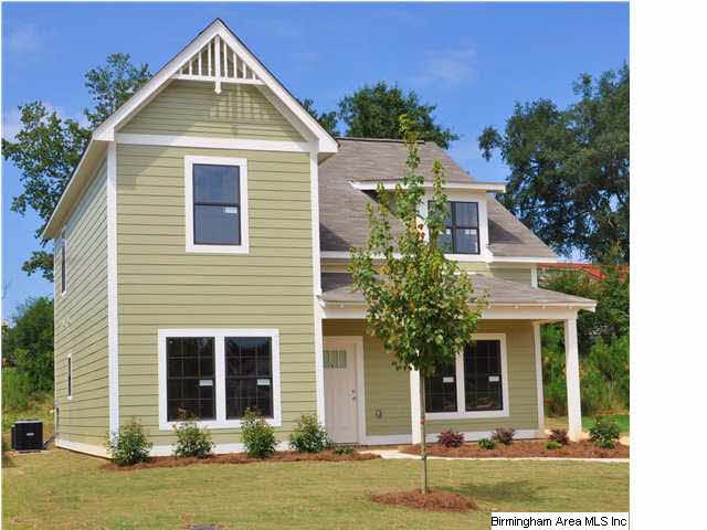 Adorable story and a half home is located on a qui