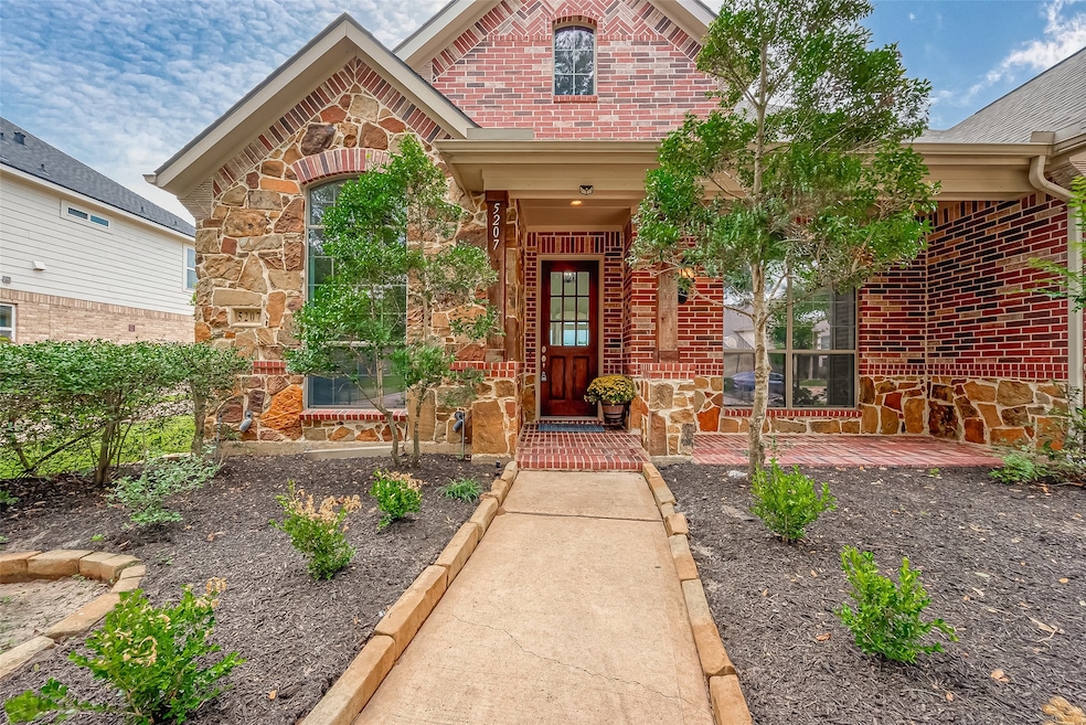 Step inside to find elegant hardwood, tile, and la