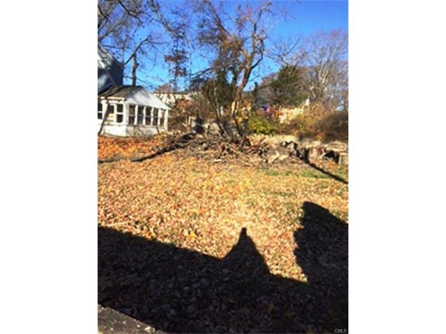 Partially fenced private level lot.