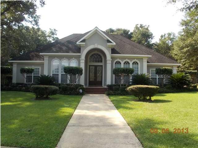 Full front view of custom-built home in Dawes Lake