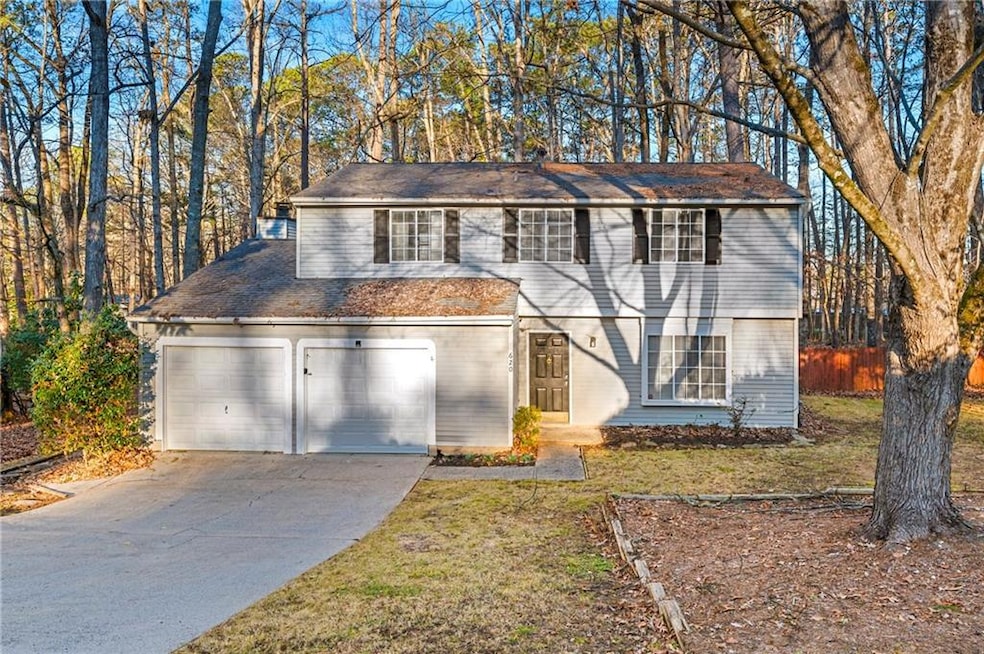 View of front of house with a garage