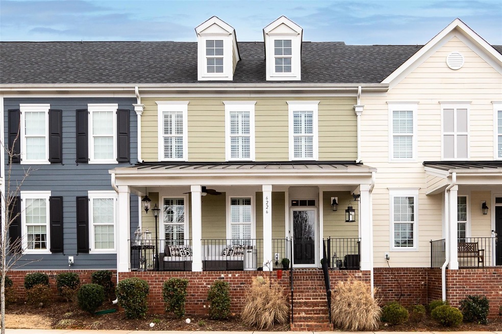 The covered front porch says 