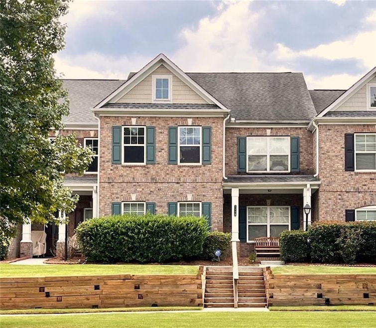Craftsman townhouse with a front porch