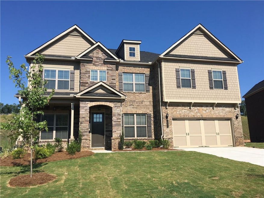 Gorgeous 4 sides brick home with stone accents on 