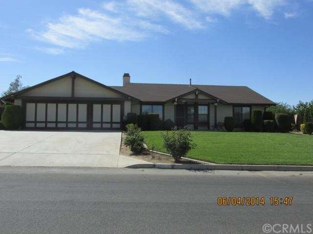 Beautiful, well maintained home with lush green la