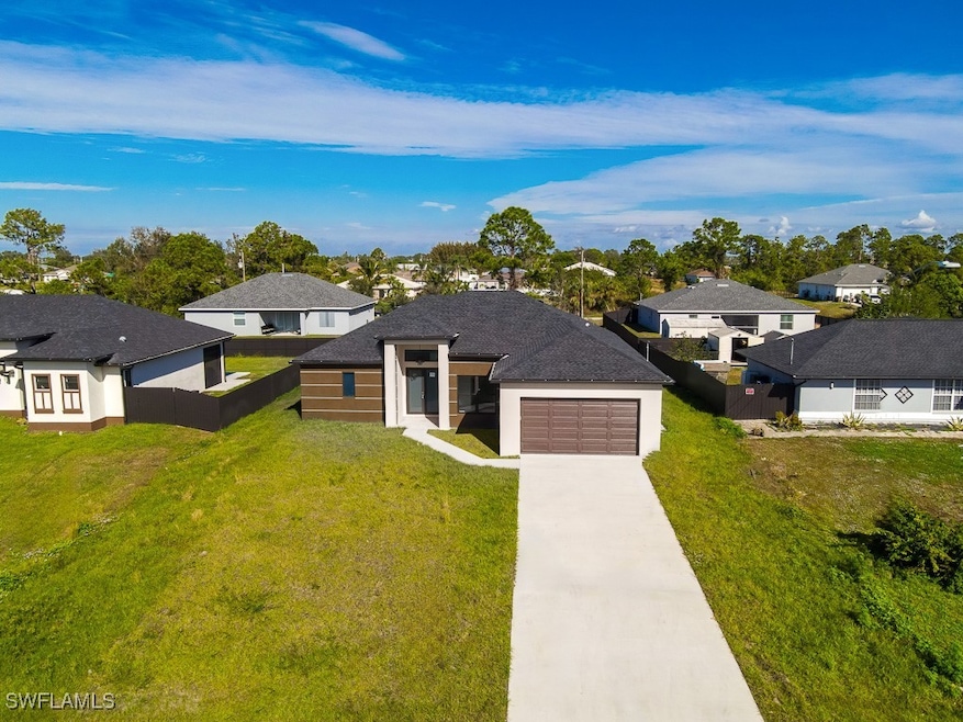 Prairie-style house featuring an attached garage,