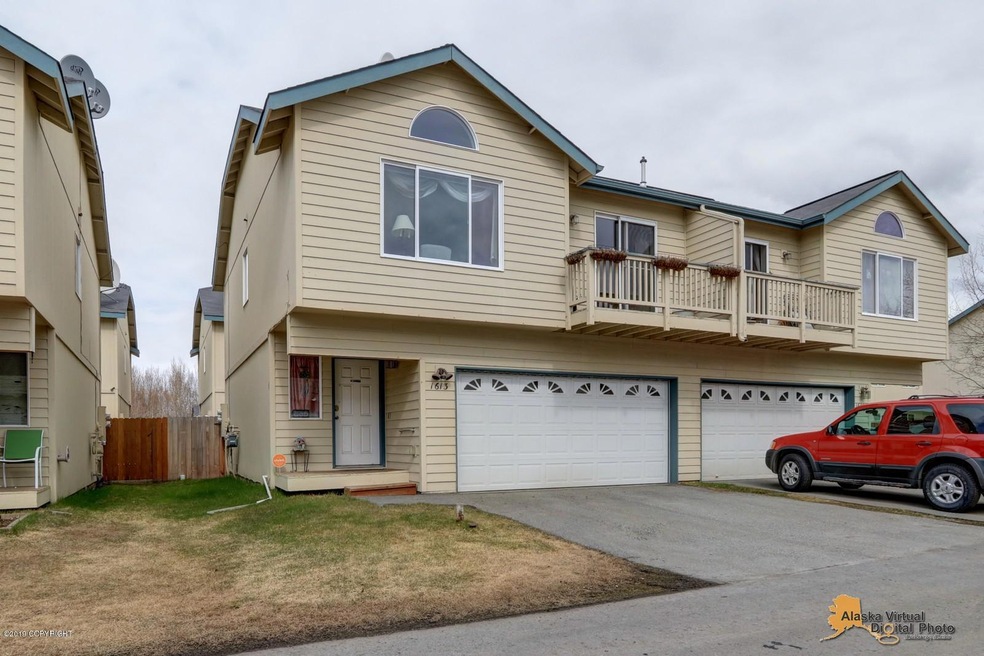Welcome home to 1613 Woodcutter Court!