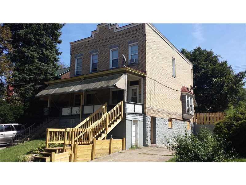 Exterior Front. This duplex is in very good condit