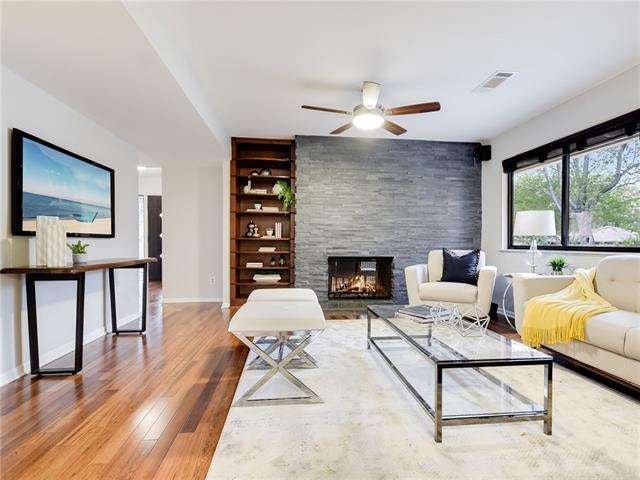 Floor to ceiling stacked stone fireplace, cherry h
