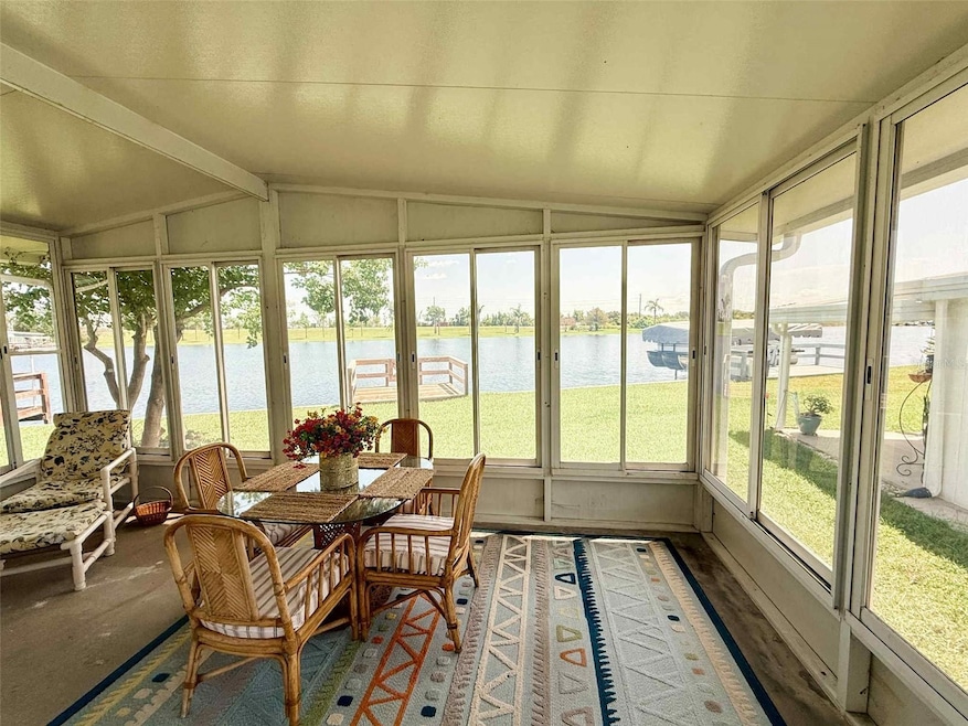 Fully enclosed Florida room has 3 foot deep concrete footer & could easily convert to living space