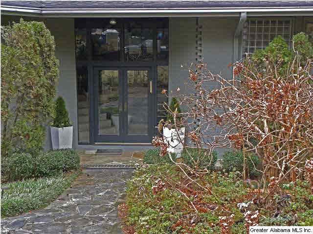 Double glass front doors welcome you to this lovel
