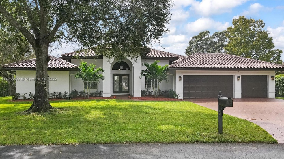 Welcome home! A friendly neighborhood of just 38 homes on a quiet street in Davie with A+ schools.