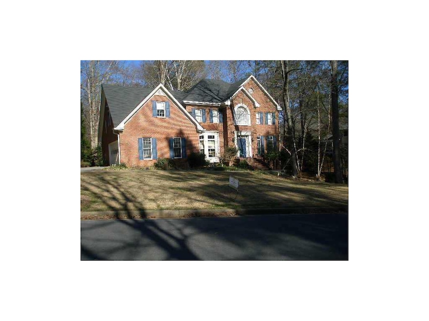 Exterior Front. Beautiful 3 sided brick home in gr