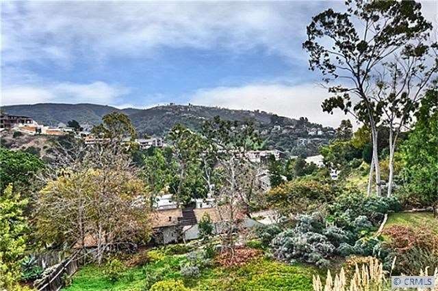Gorgeous hillside vistas, city lights and peak oce
