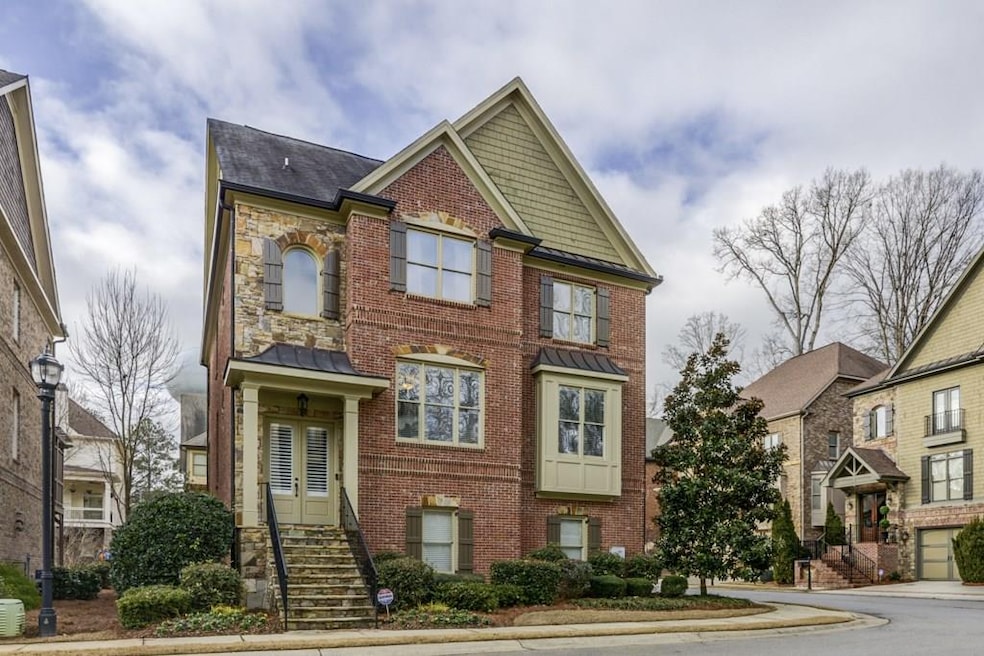 Three sided brick home in quiet gated community