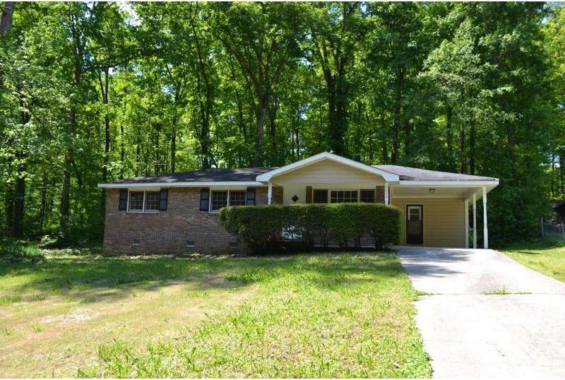 4 SIDED BRICK RANCH ON LARGE LOT WITH PRIVATE BACK