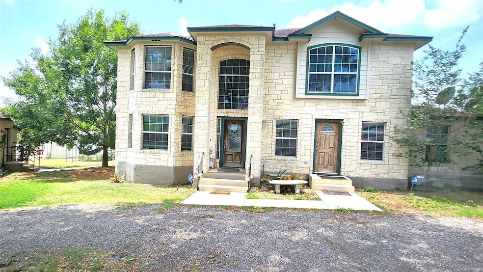 View of front of home with stone siding