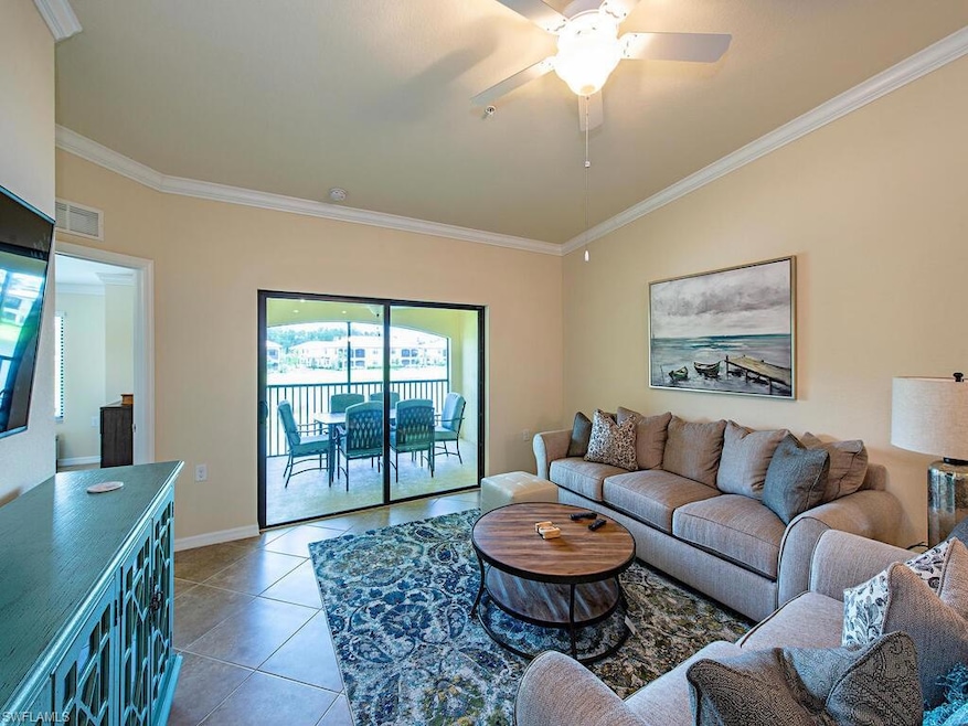 Living room featuring light tile patterned floors,