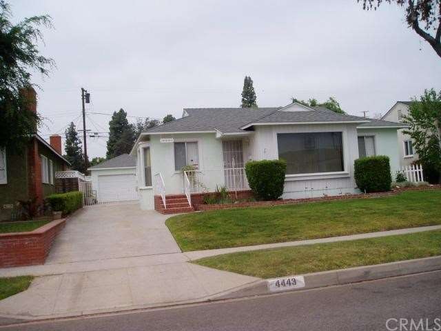 Great curb apeal, front porch, large newer windows
