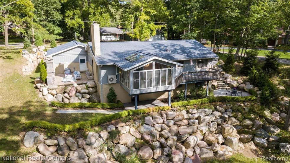 Set on a dreamy wooded parcel, nearly 1 acre lot