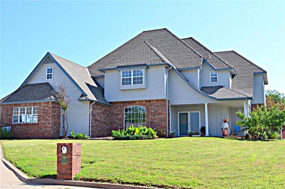 Stunning executive home at one of the highest points in Shawnee, located on a cul-de-sac.