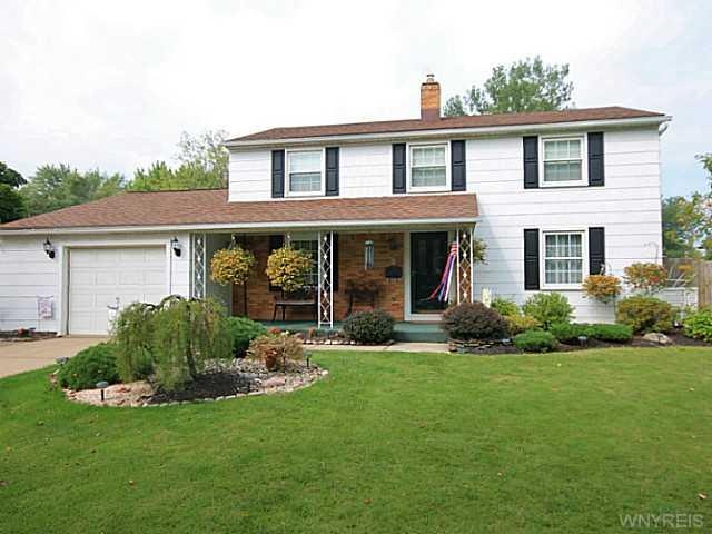 Exterior Front. CENTER ENTRANCE COLONIAL WITH FULL