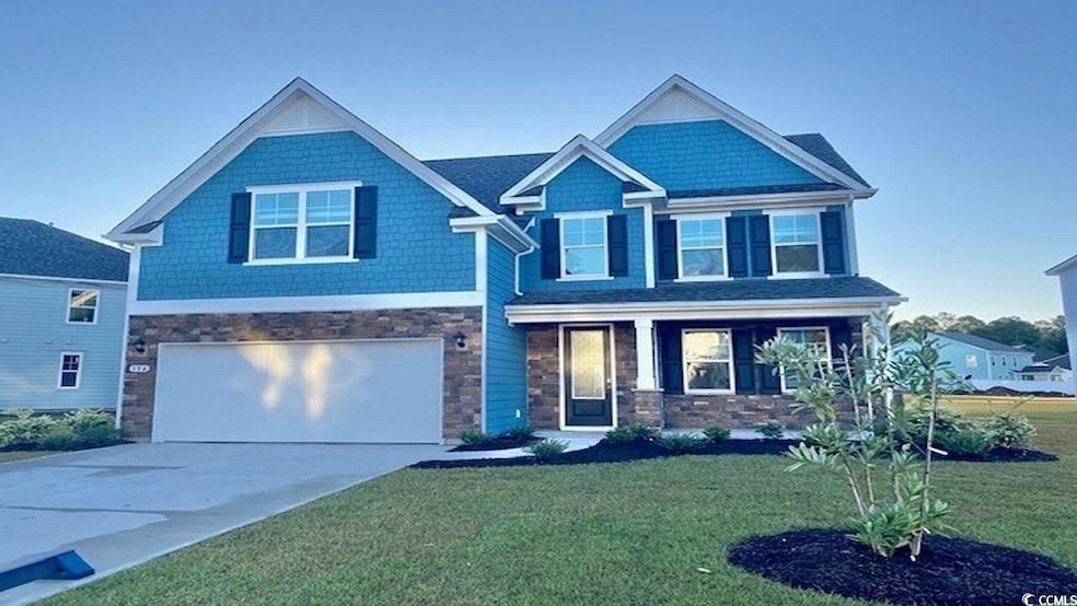 Craftsman-style house featuring an attached garage