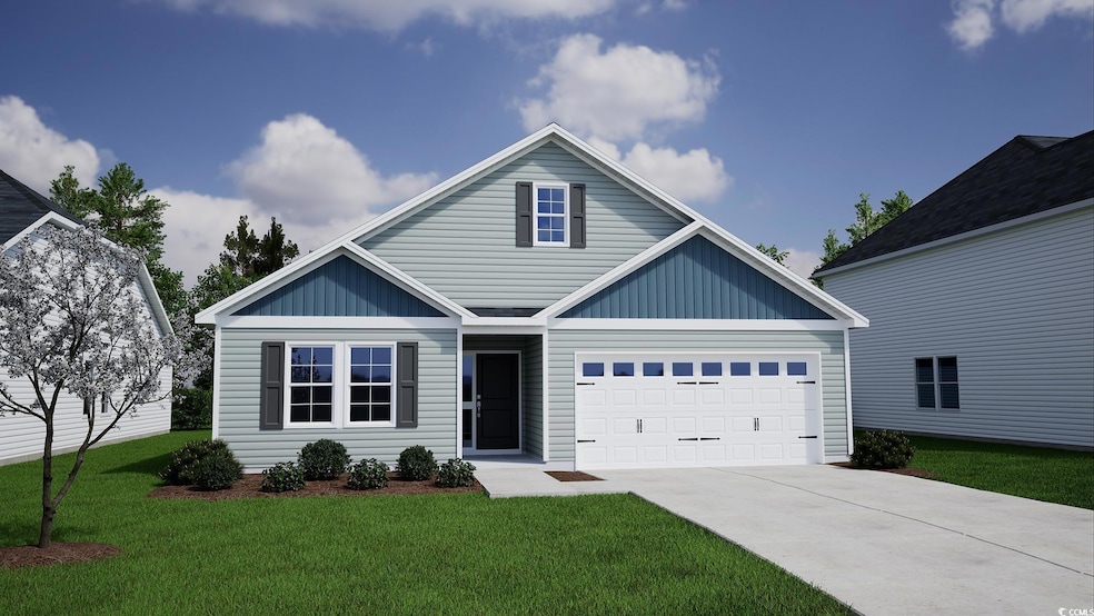 View of front of property featuring driveway, an a