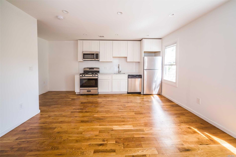 8741 110th St unit 2nd Fl, Richmond Hill, NY 11418 - photo 1