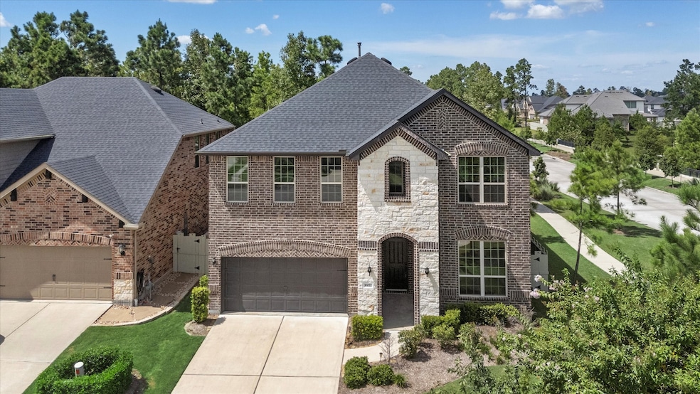 10057 Red Beadtree Place, Conroe, TX 77385 - photo 1