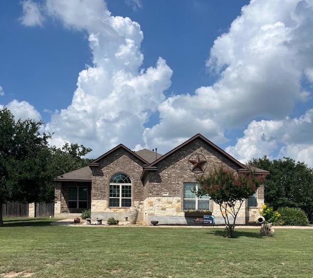 View of front of house featuring stone siding