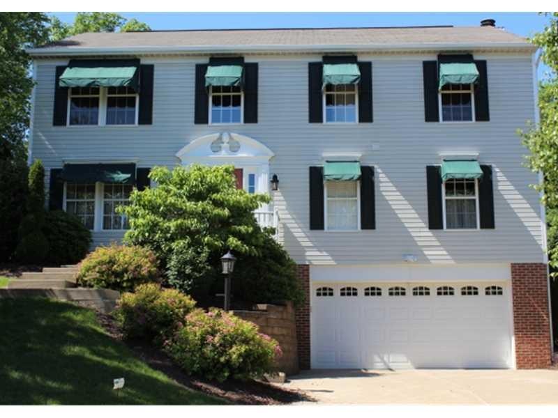 Exterior Front. Mature landscaping, 2 car integral