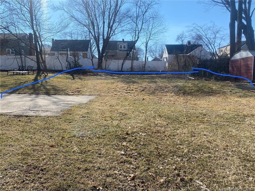.23 acres, elevated above the road, and predominan