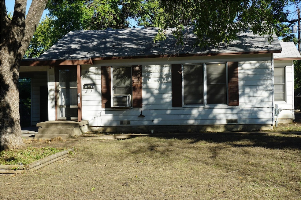 View of front of house featuring a front lawn and 