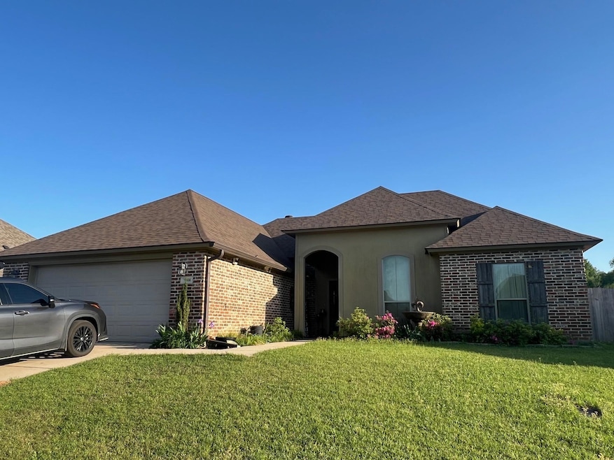View of front of home featuring an attached garage