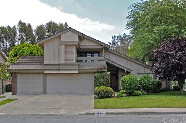 Great curb appeal and beautiful upgrades in this c